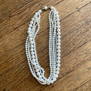 Multi-strand mock pearl necklace with mock pearl clasp